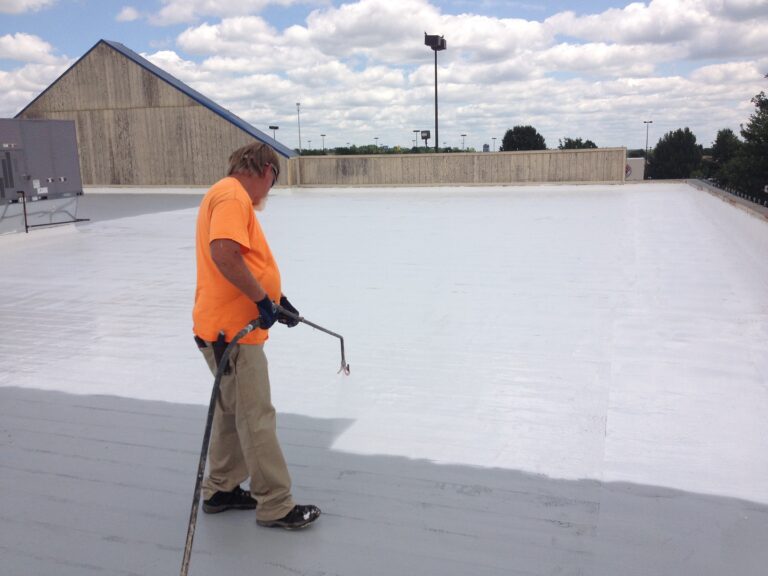 applying a protective roof coating on a flat roof