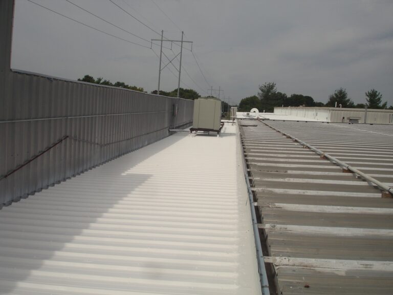 Commercial roof with white elastomeric coating.