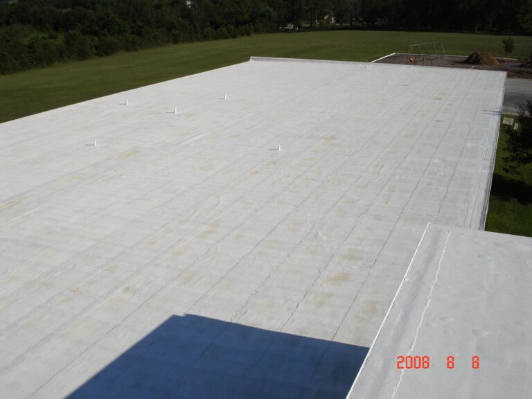 Flat white roof with elastomeric coating -2